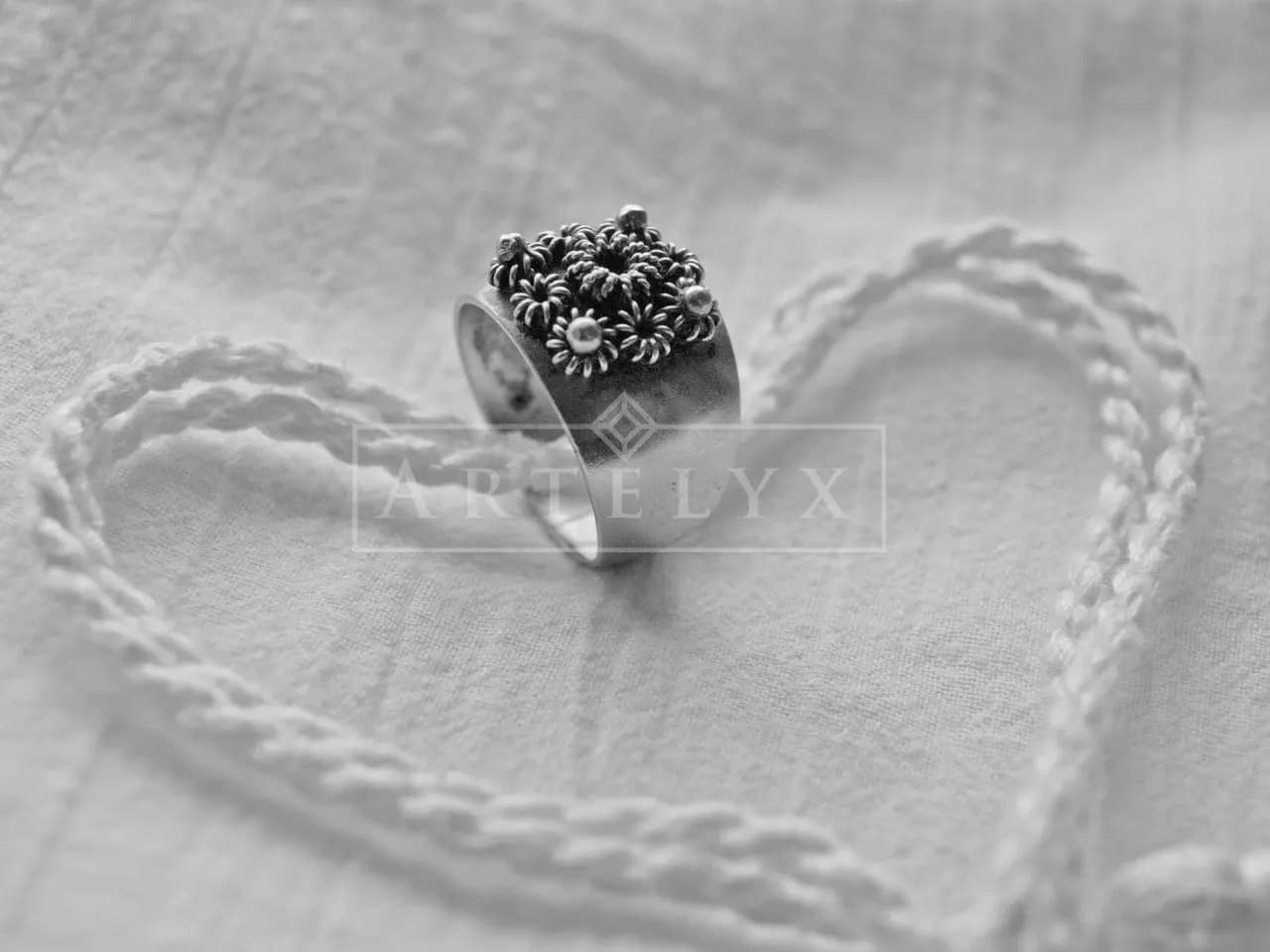 Floral Ring in a Heart of Thread metal wall art by Artelyx Studios